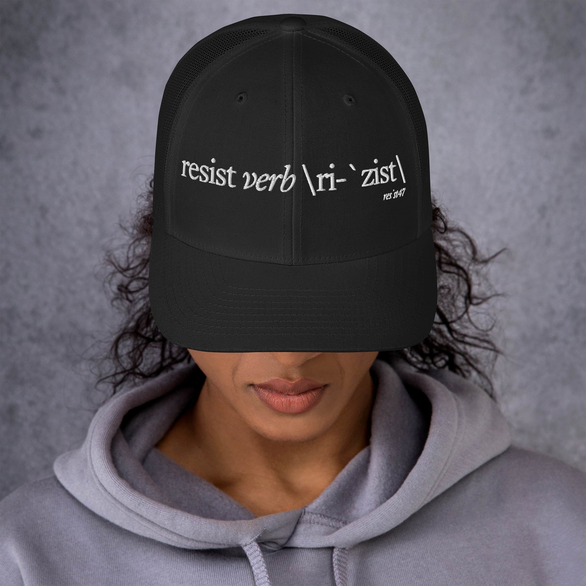 Black cap with “Define Resist - Baseball” graphic, front view
