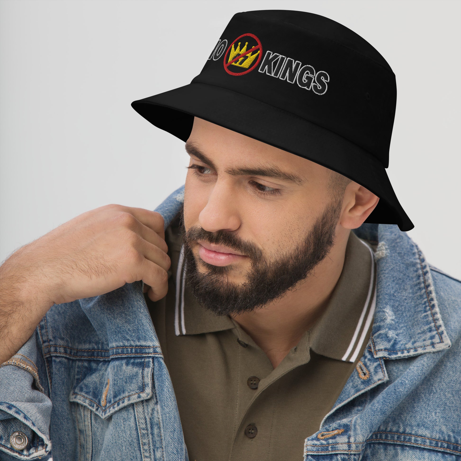 Navy bucket hat with “No Kings” graphic, front view