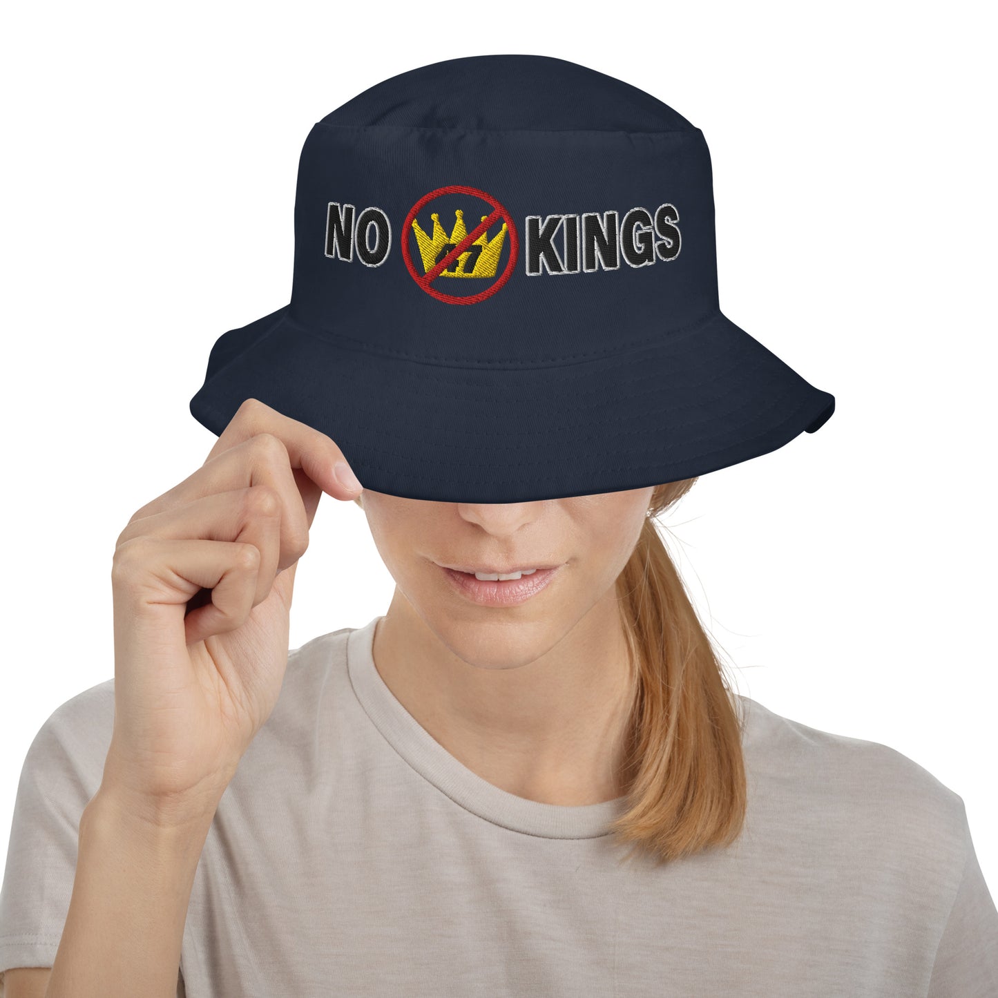 White bucket hat with “No Kings” graphic, front view