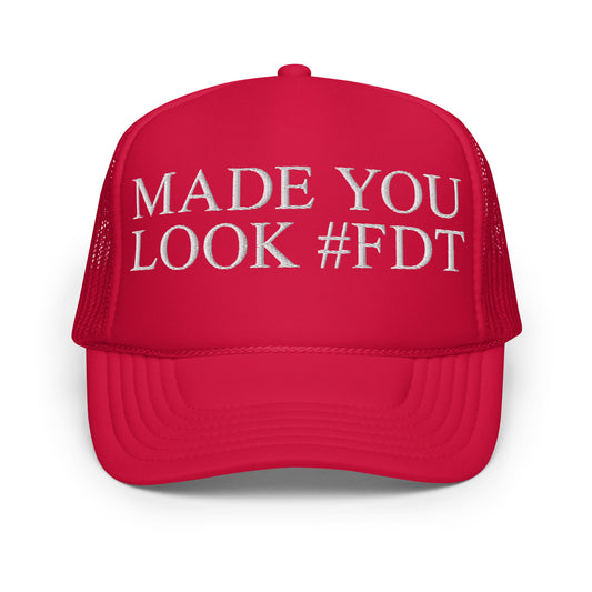 Red parody hat with “MADE YOU LOOK #FDT” embroidery, front view