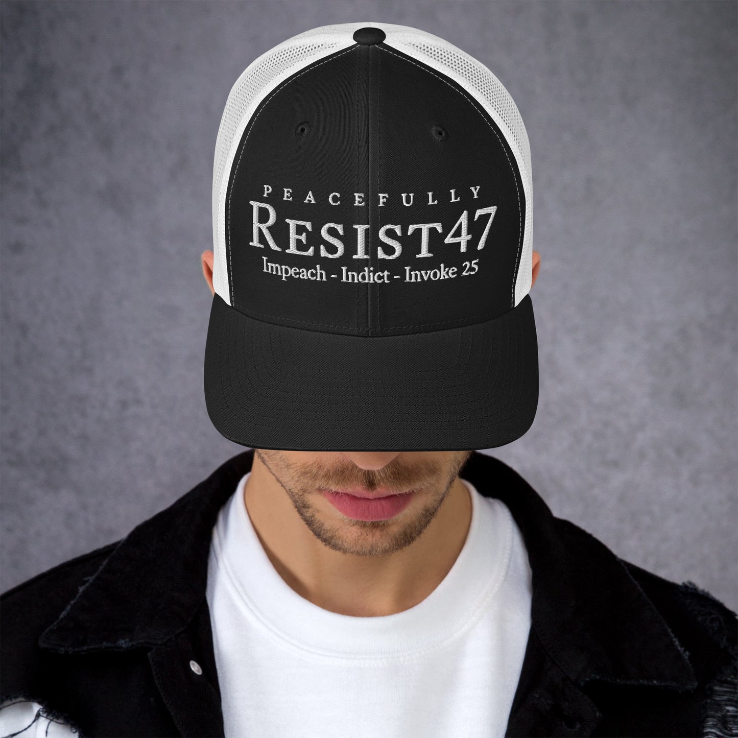 Charcoal/ Black cap with “Resist47 Protest” graphic, front view