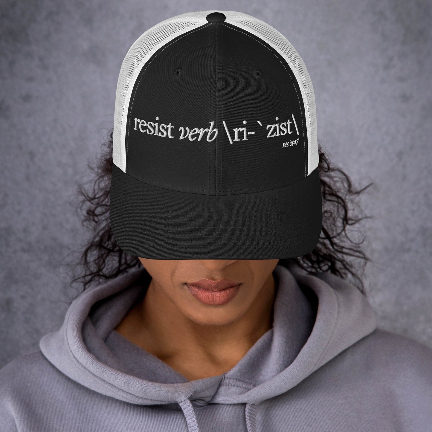 Navy cap with “Define Resist - Baseball” graphic, front view