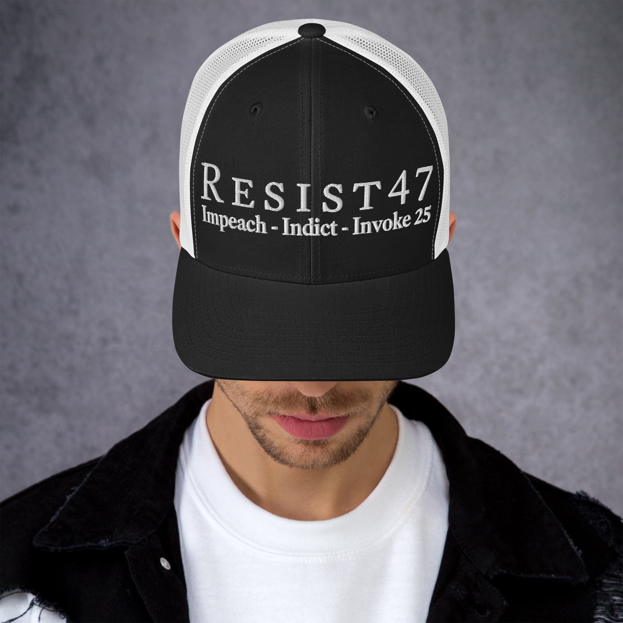 cap with “Resist47 Protest” graphic, front view