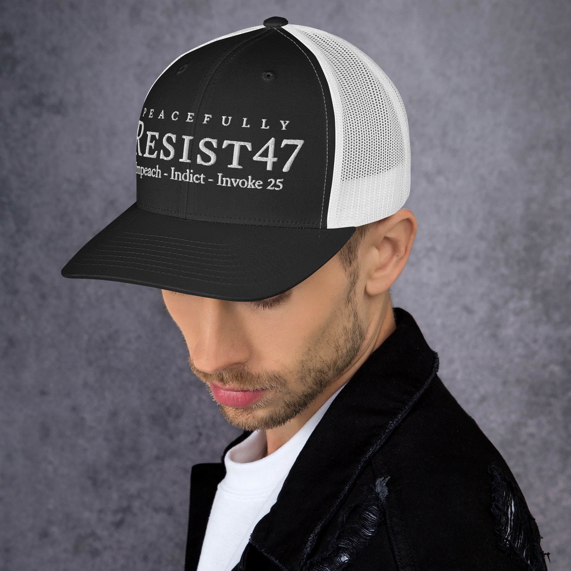 Charcoal cap with “Resist47 Protest” graphic, front view