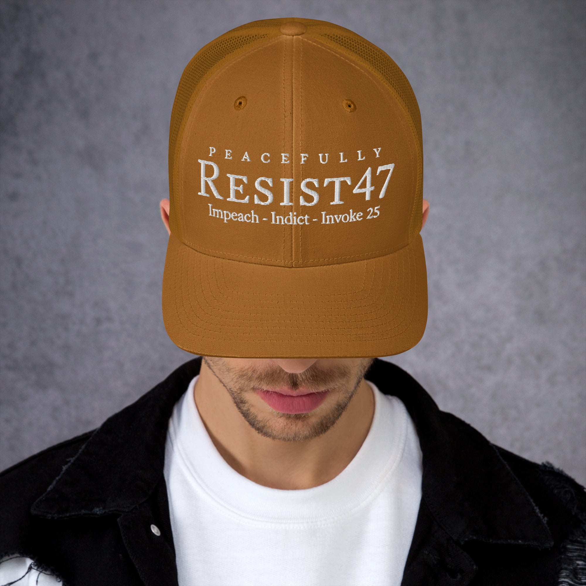 cap with “Resist47 Protest” graphic, front view