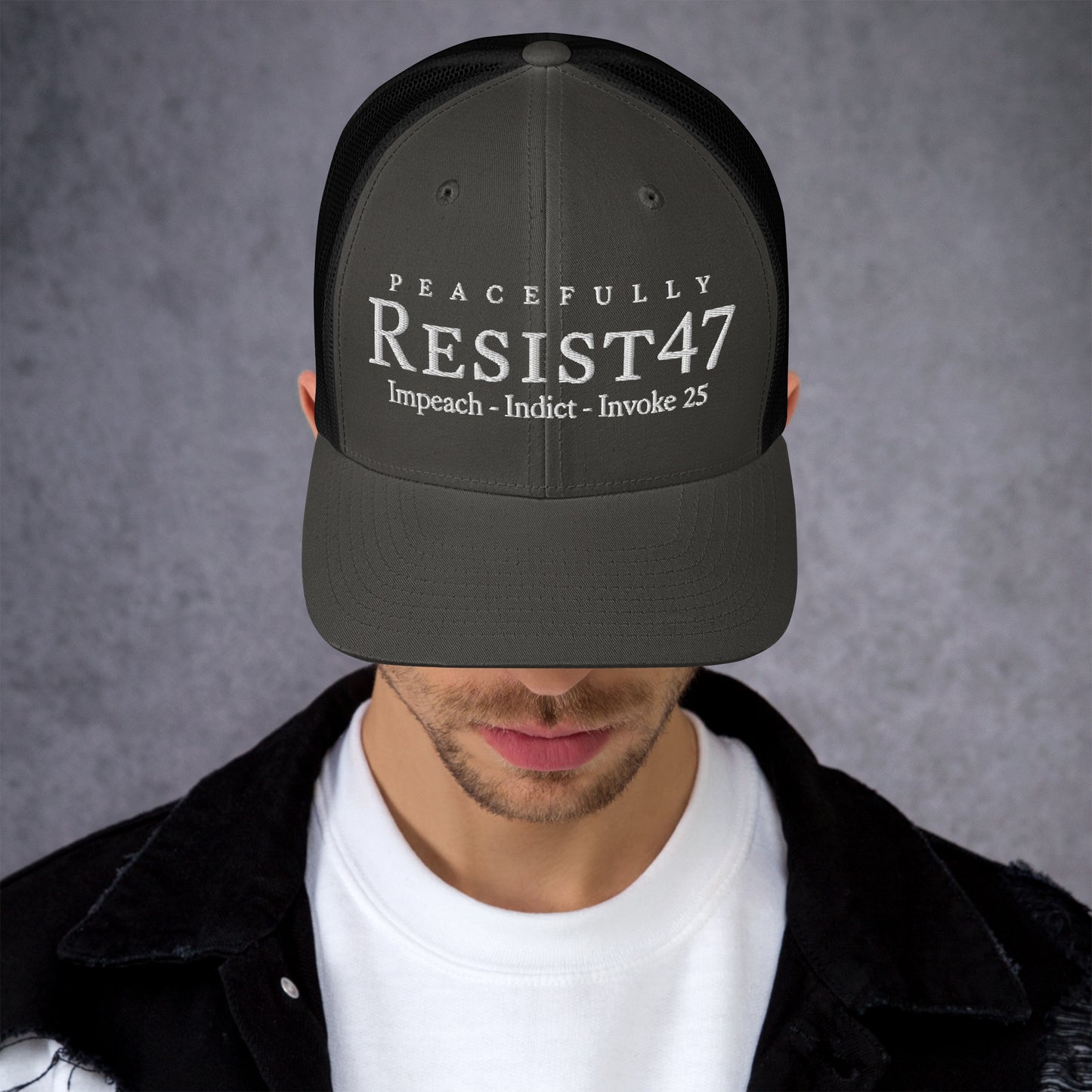 Evergreen cap with “Resist47 Protest” graphic, front view