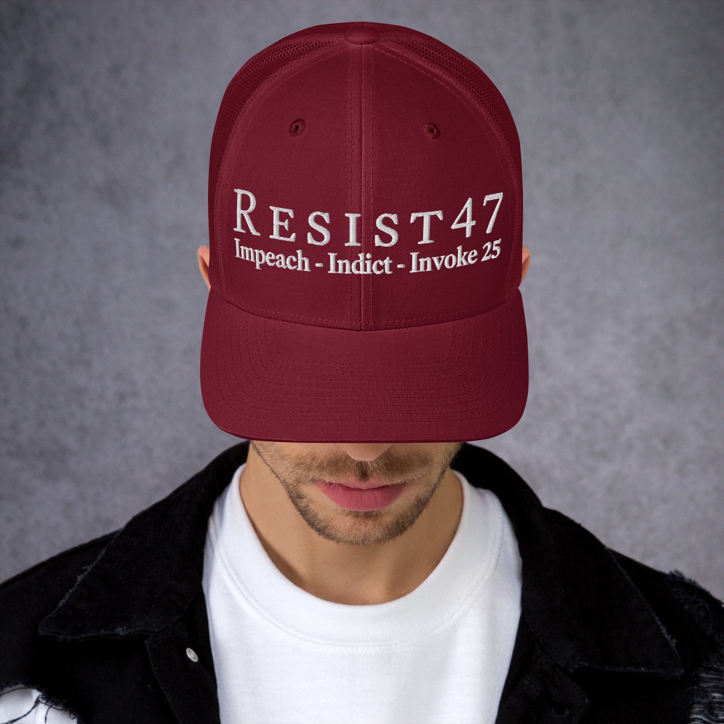 cap with “Resist47 Protest” graphic, front view