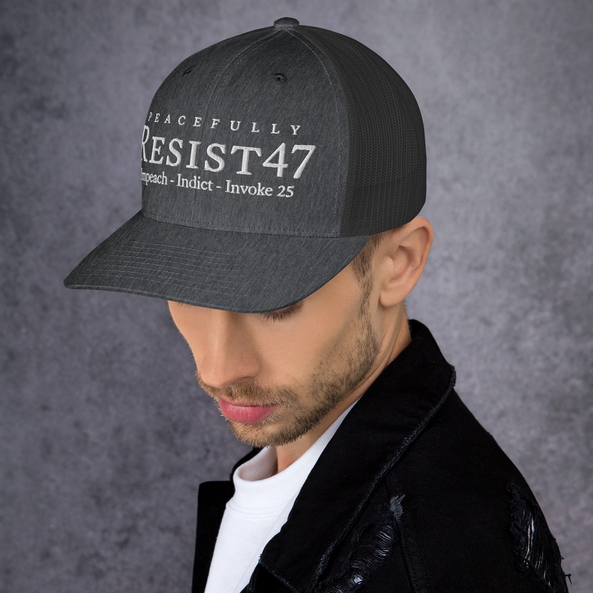 cap with “Resist47 Protest” graphic, front view