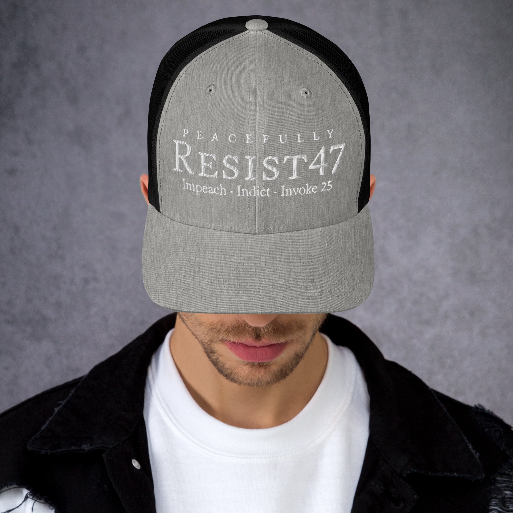 cap with “Resist47 Protest” graphic, front view