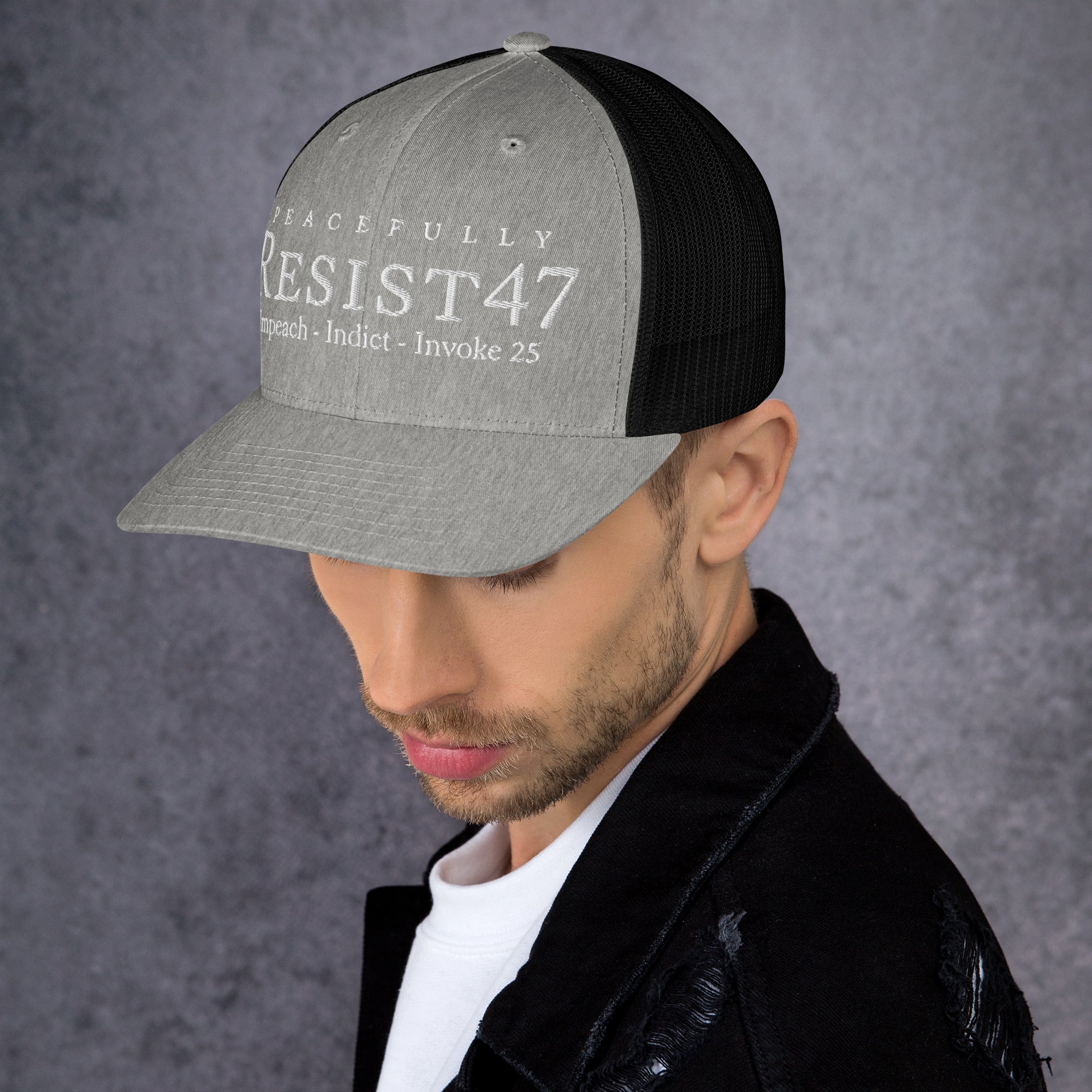 cap with “Resist47 Protest” graphic, front view