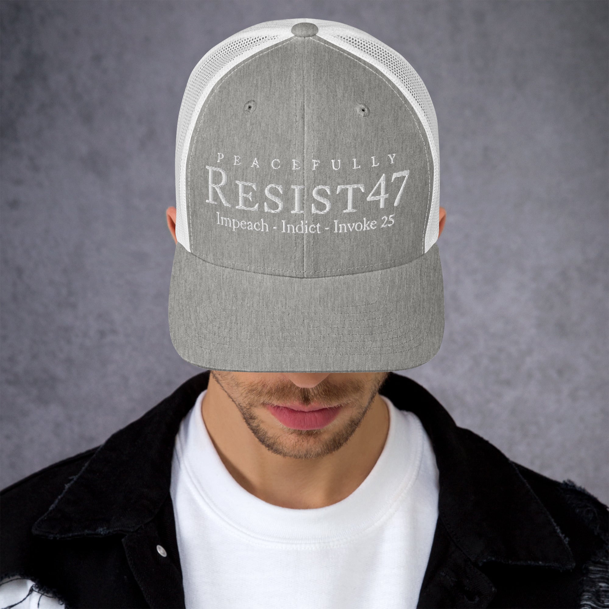 cap with “Resist47 Protest” graphic, front view