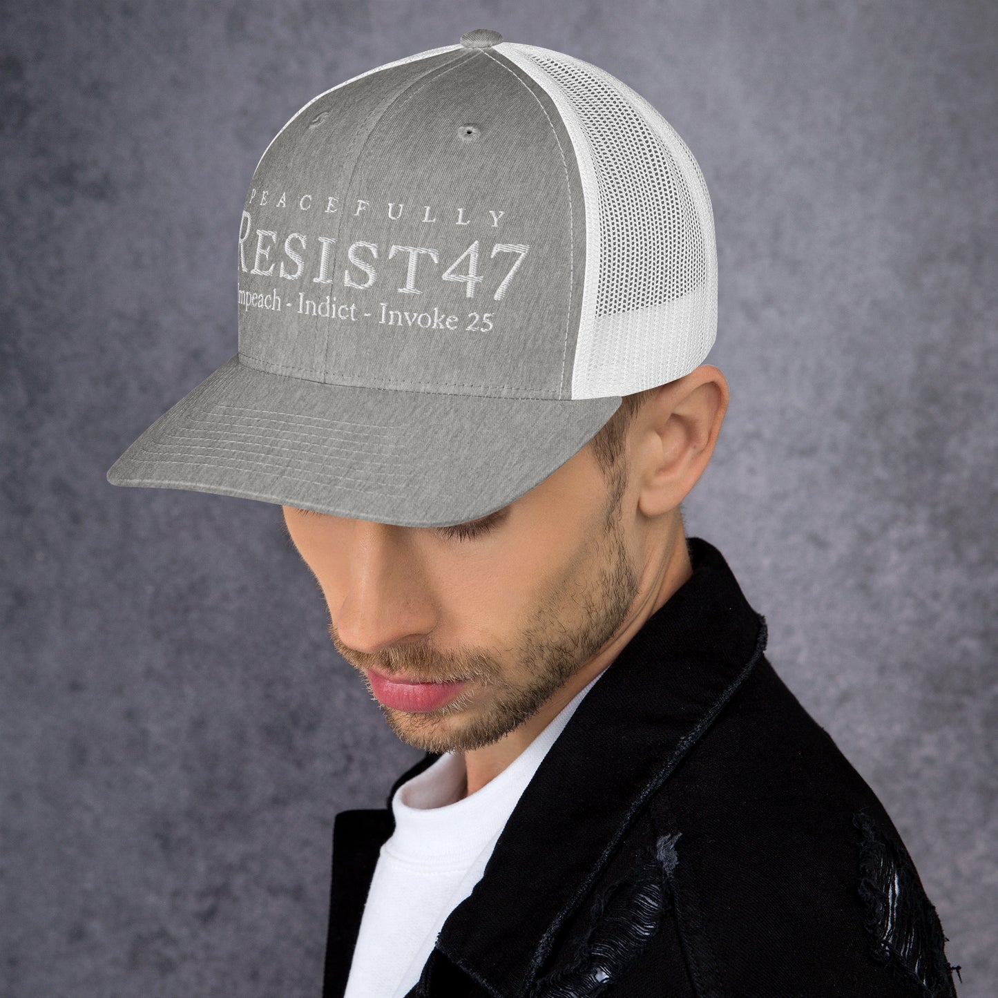 cap with “Resist47 Protest” graphic, front view
