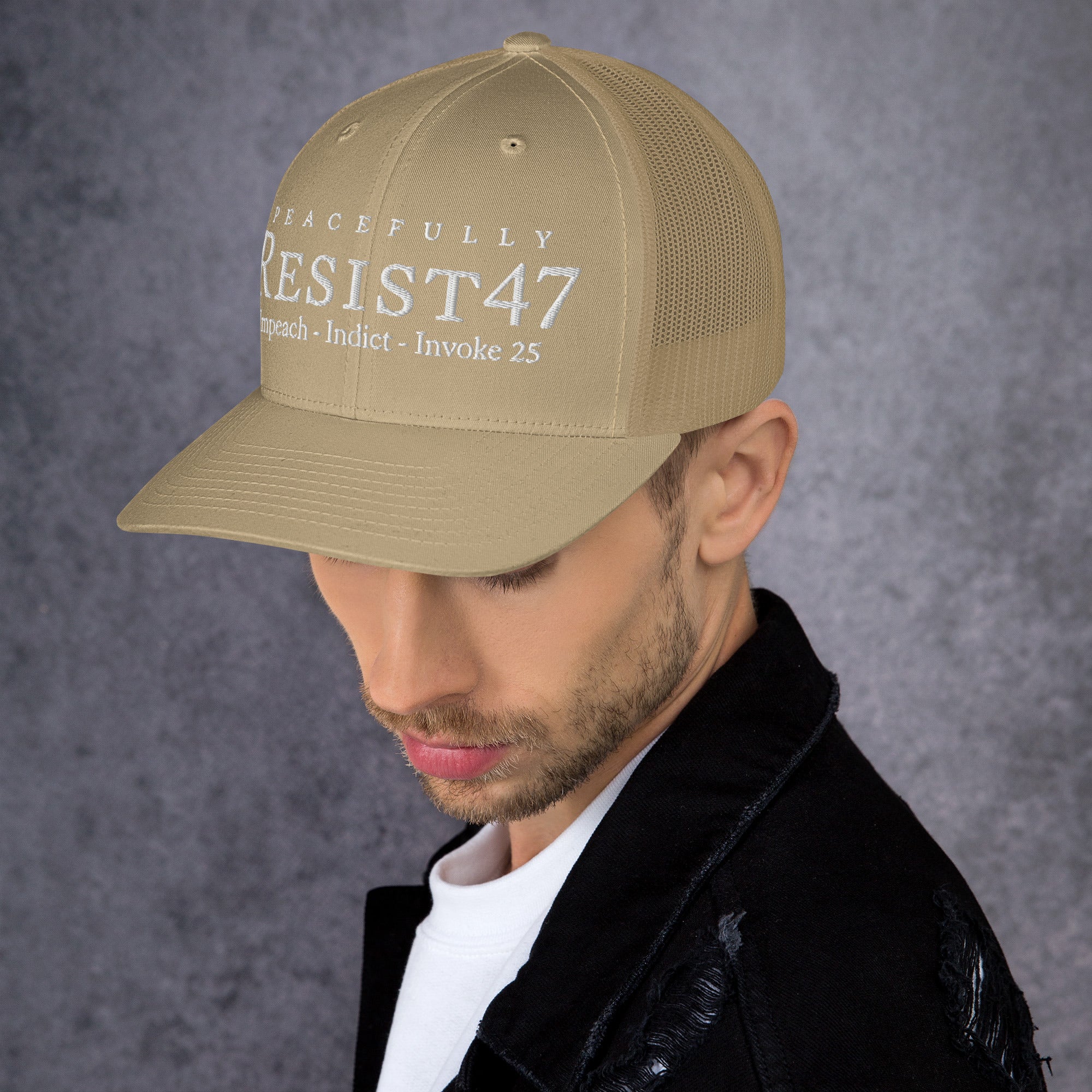 cap with “Resist47 Protest” graphic, front view
