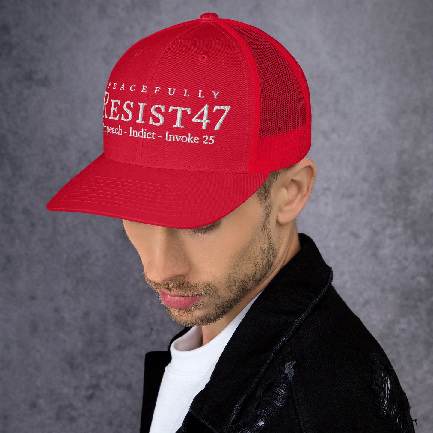 Khaki cap with “Resist47 Protest” graphic, front view