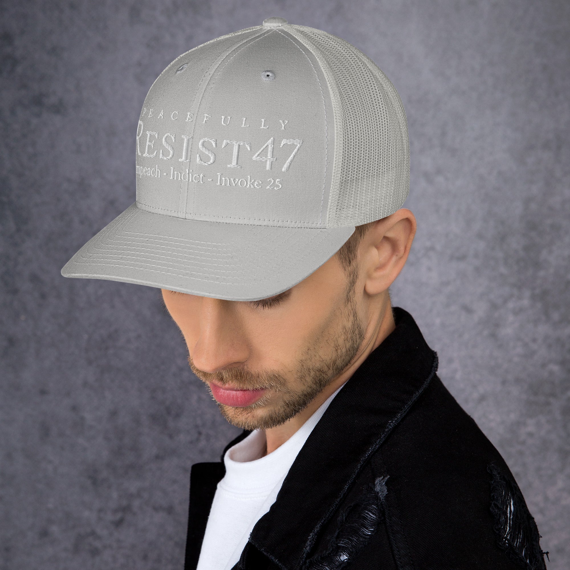 cap with “Resist47 Protest” graphic, front view