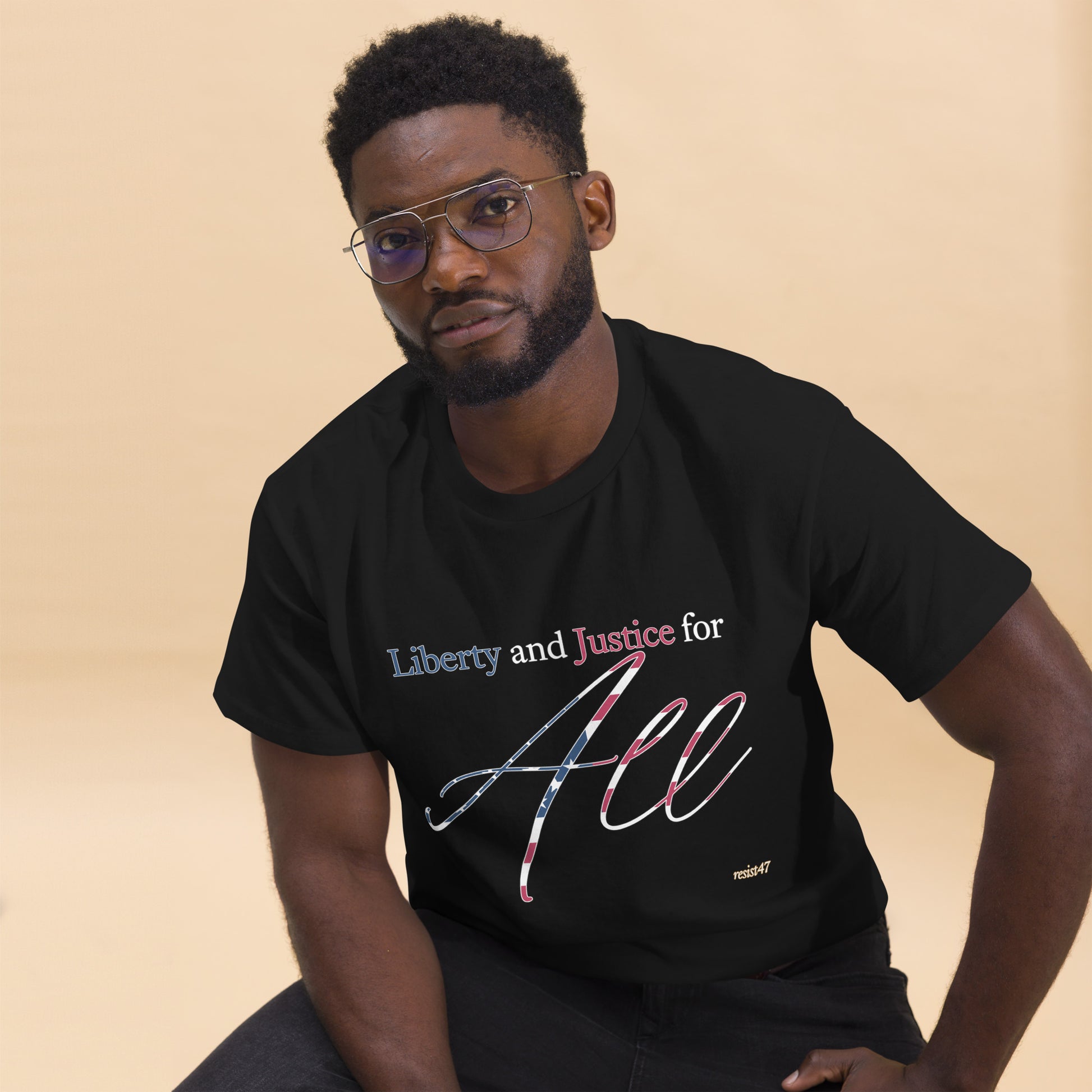 Black tee with “Liberty & Justice Protest” graphic, front view