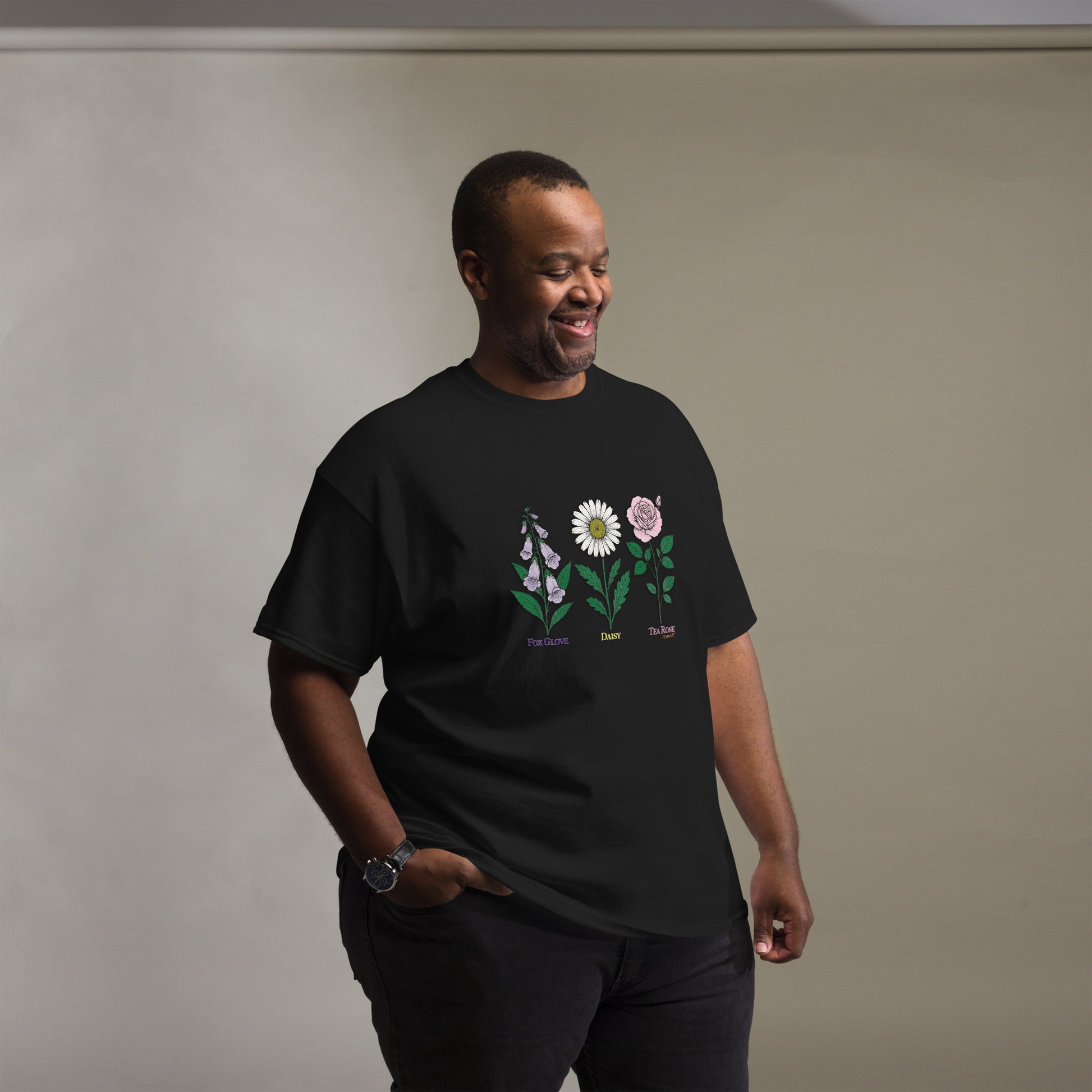 Black t-shirt with “FDT Flowers Protest” graphic, front view
