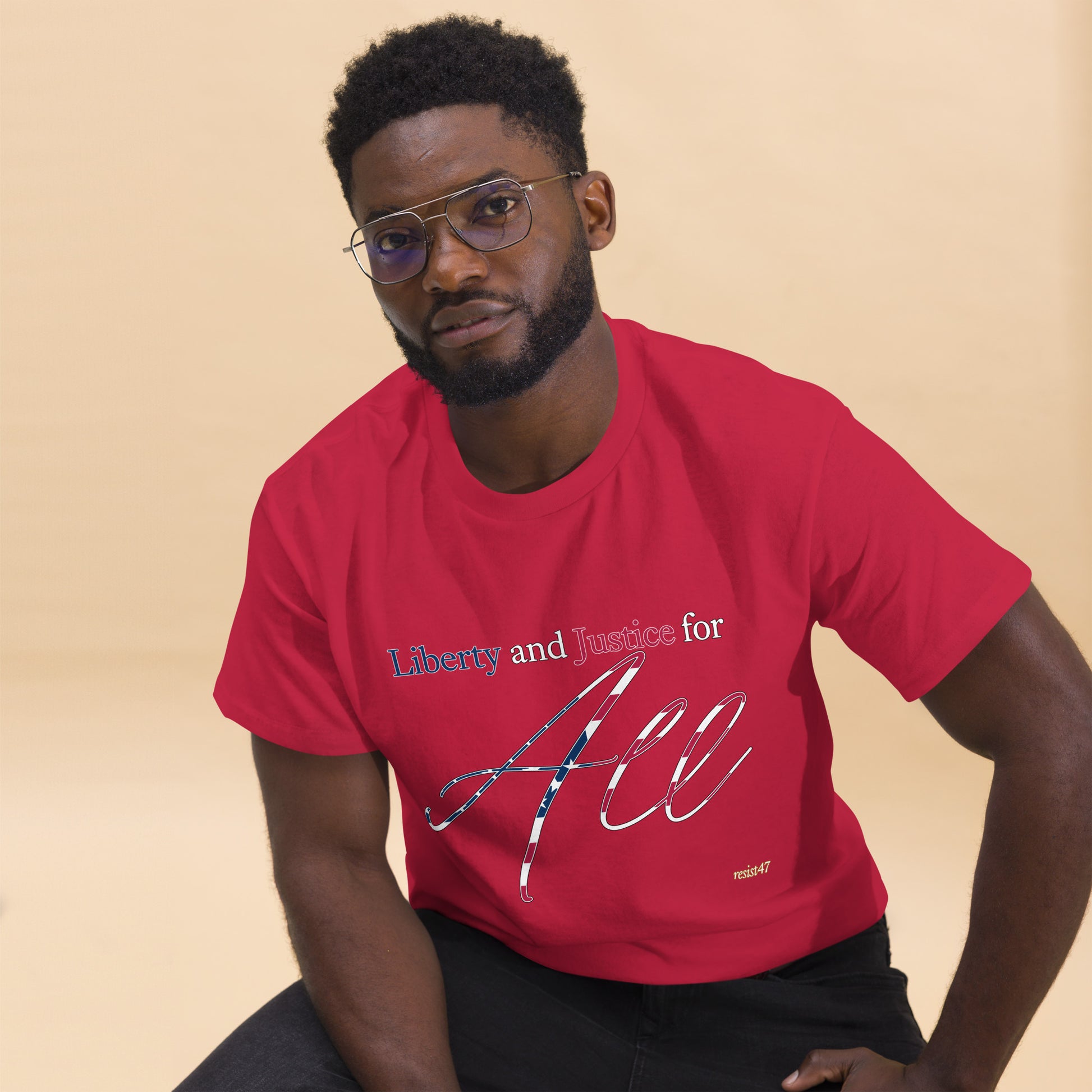 Navy tee with “Liberty & Justice Protest” graphic, front view