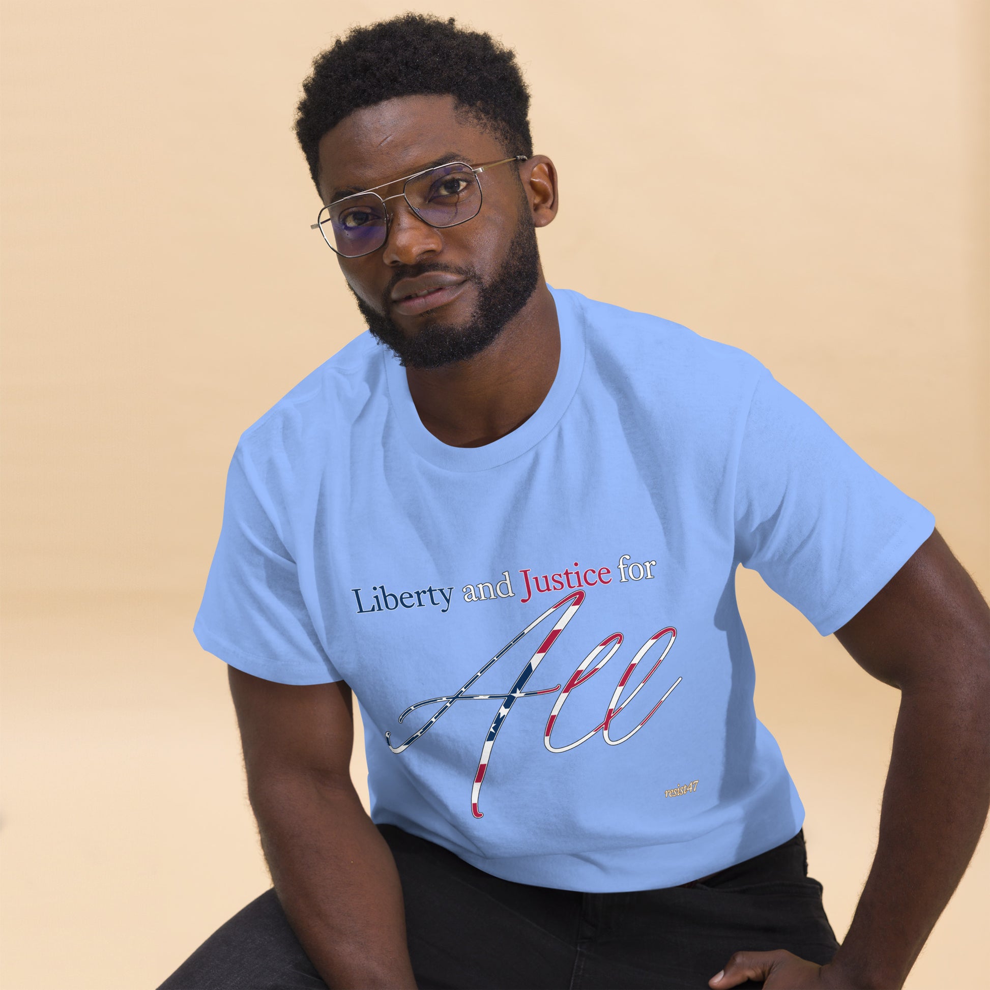 Purple tee with “Liberty & Justice Protest” graphic, front view