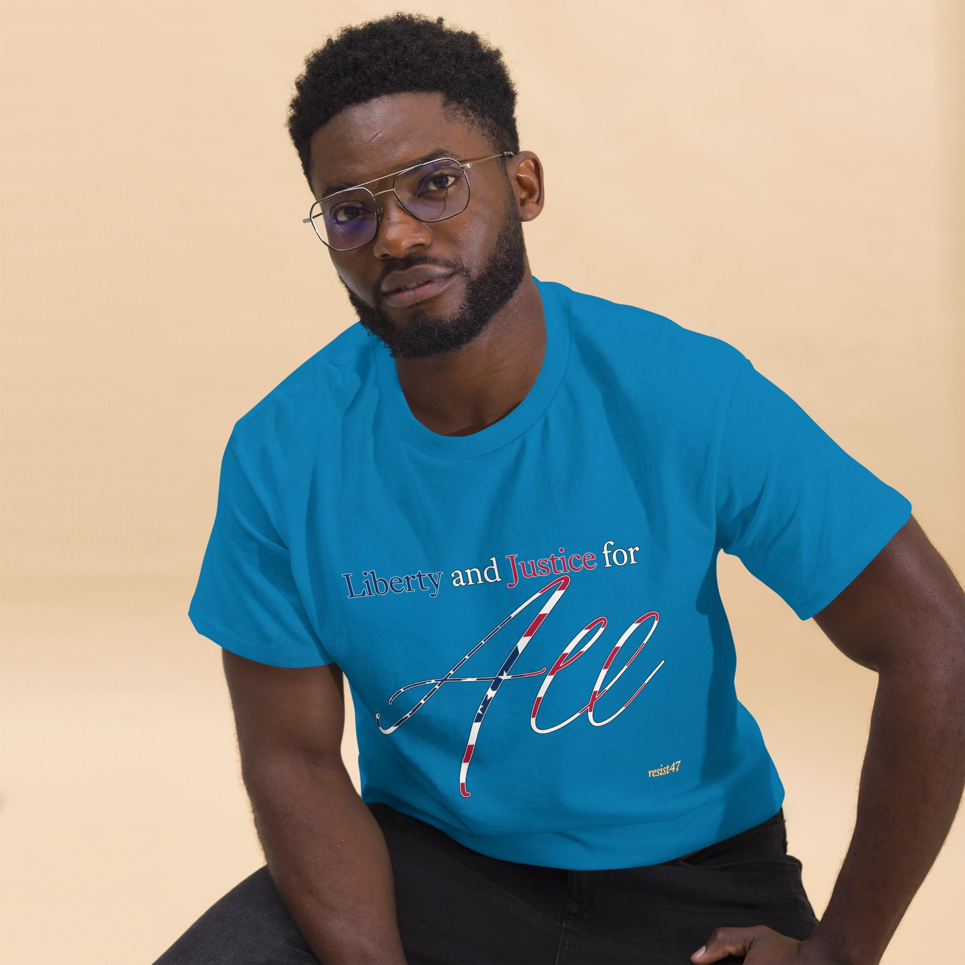 Navy tee with “Liberty & Justice Protest” graphic, front view
