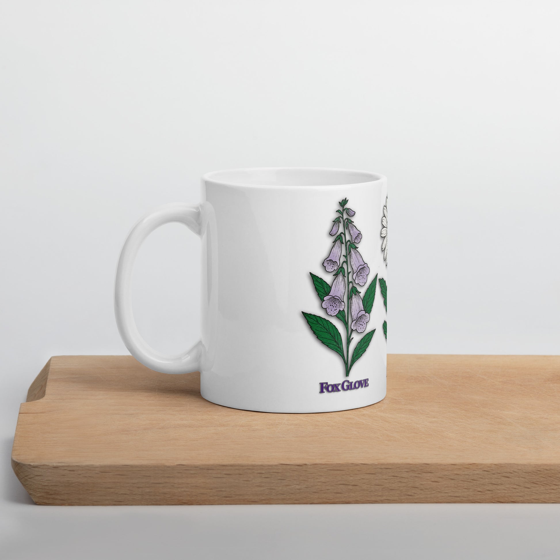 mug with “FDT Flowers Protest” graphic, front view