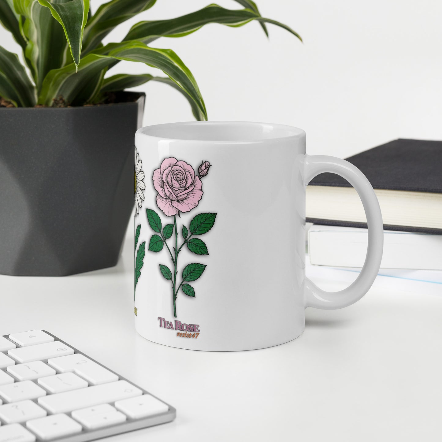 mug with “FDT Flowers Protest” graphic, front view
