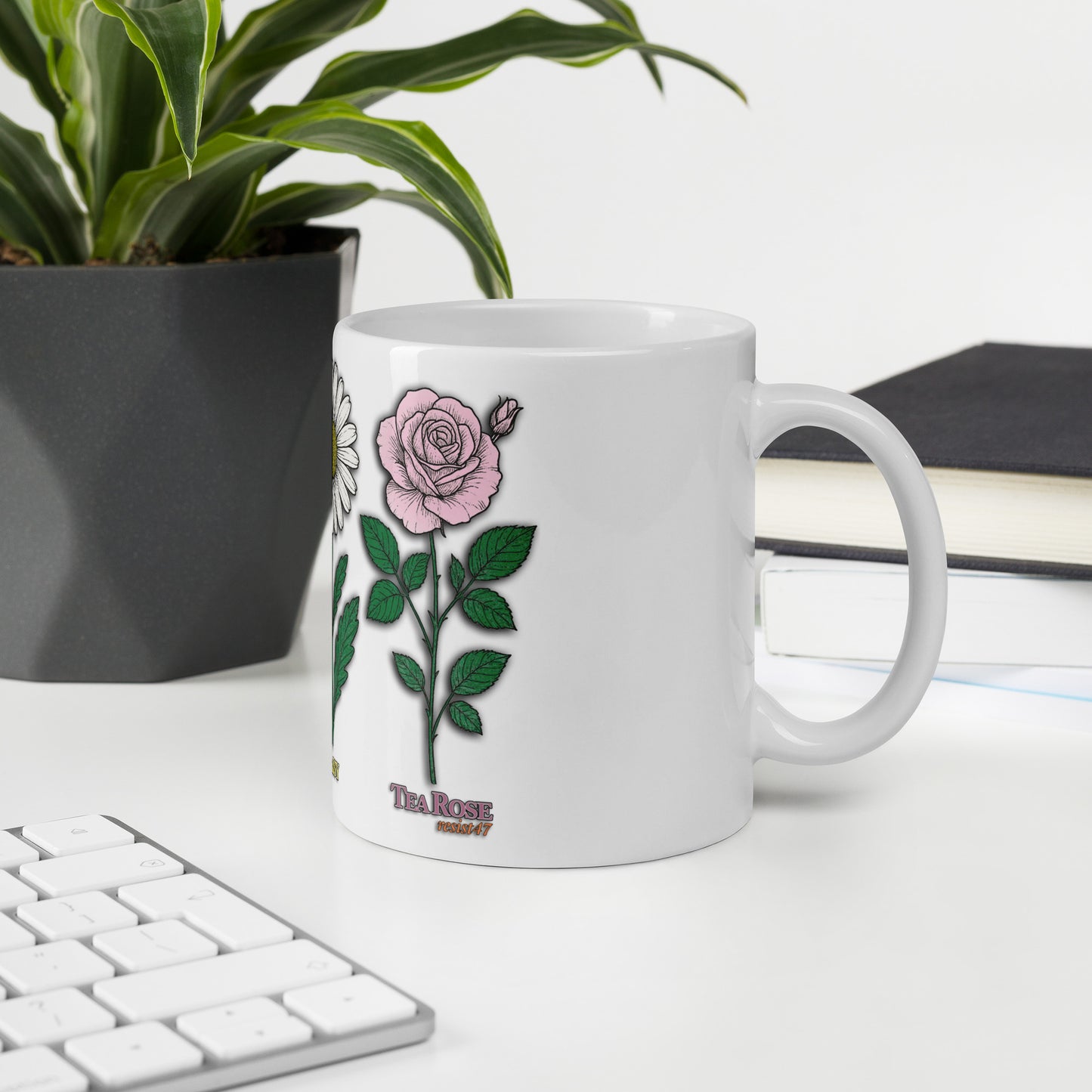 mug with “FDT Flowers Protest” graphic, front view