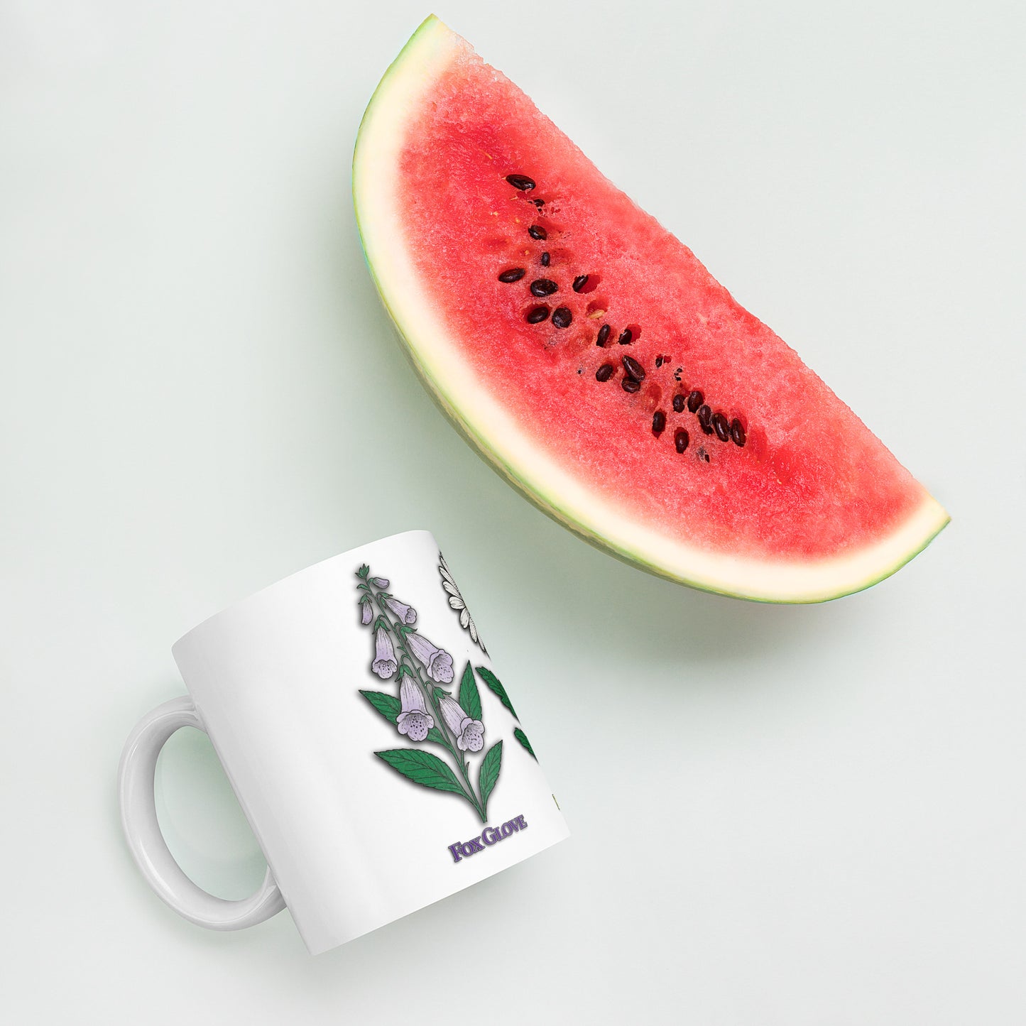 mug with “FDT Flowers Protest” graphic, front view