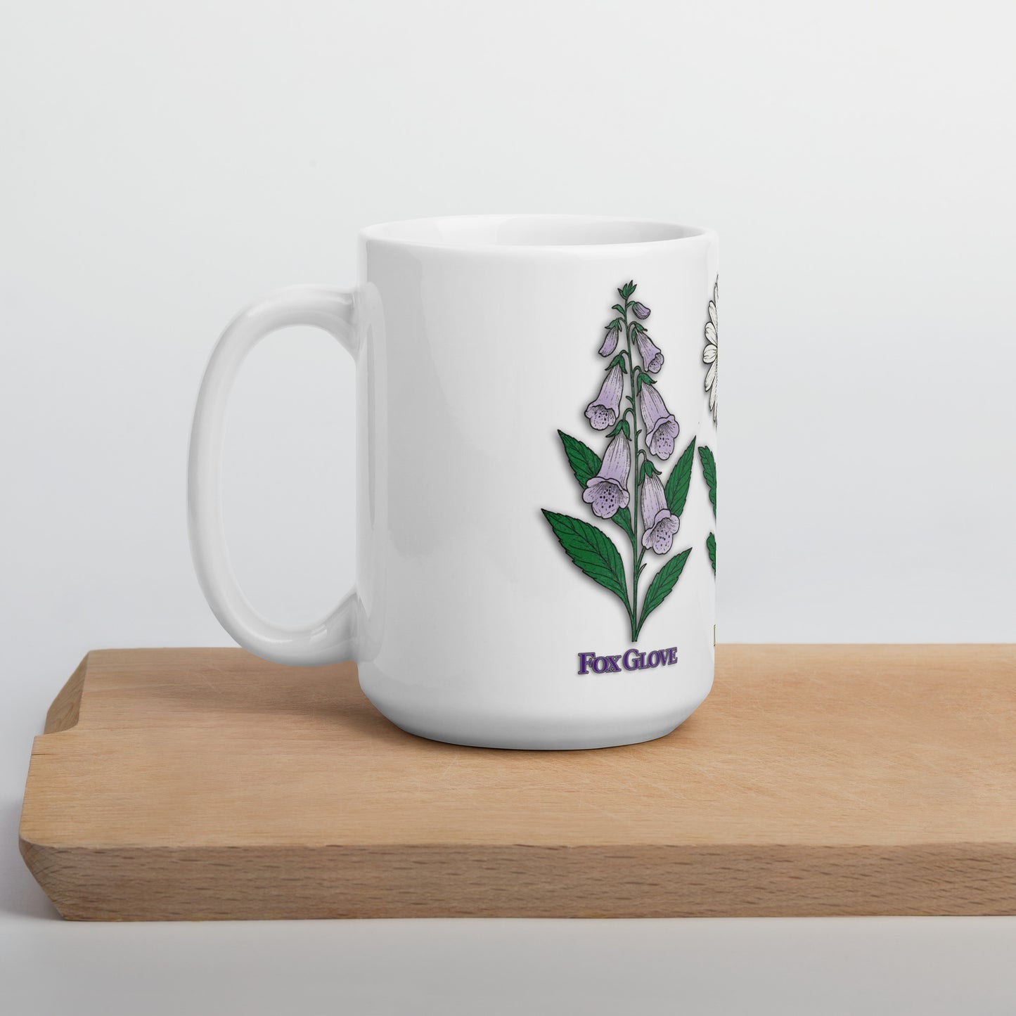 mug with “FDT Flowers Protest” graphic, front view