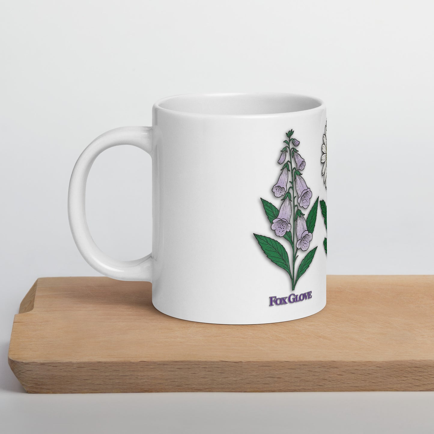 mug with “FDT Flowers Protest” graphic, front view