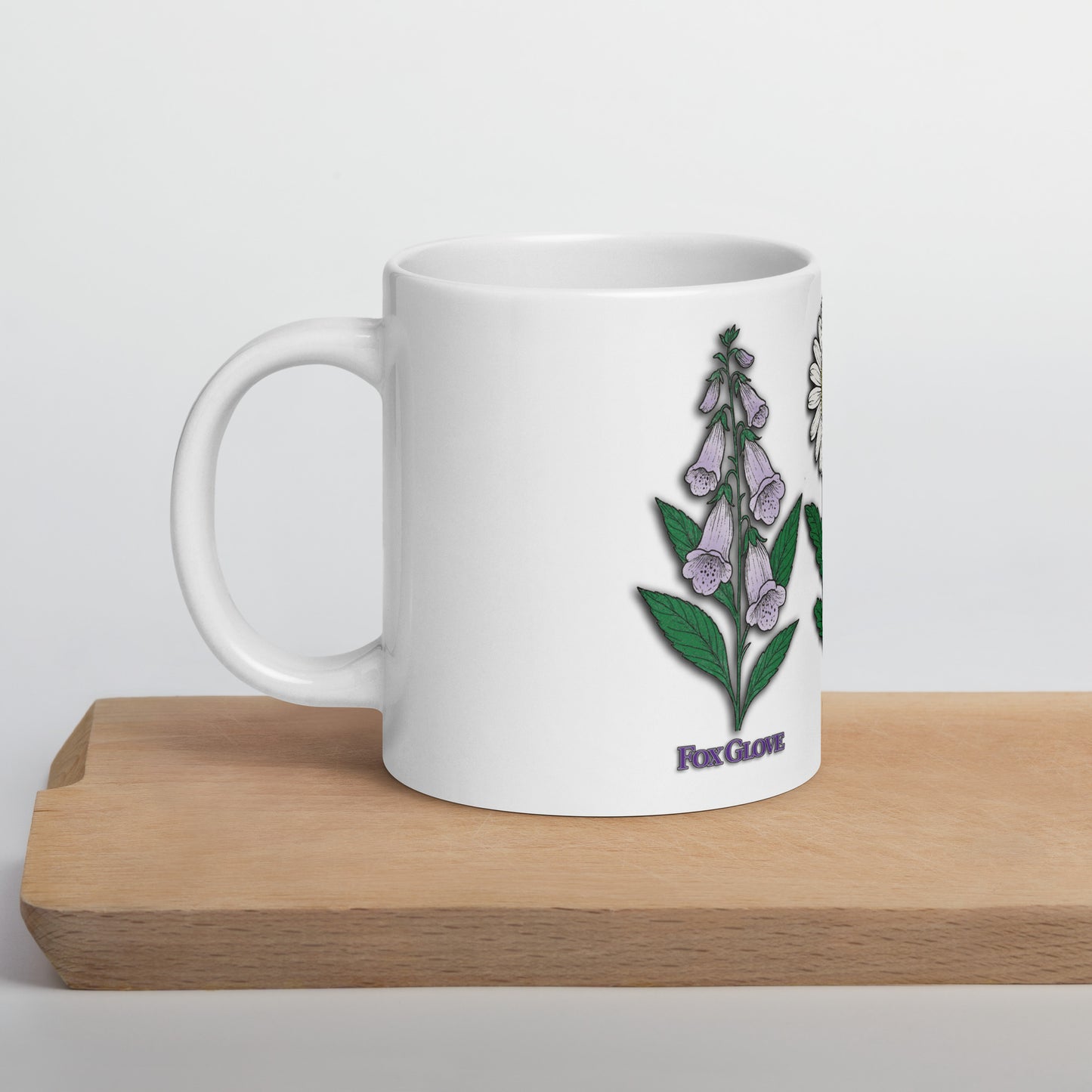 mug with “FDT Flowers Protest” graphic, front view